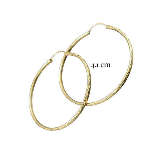 Arracada facetada Oro 10k